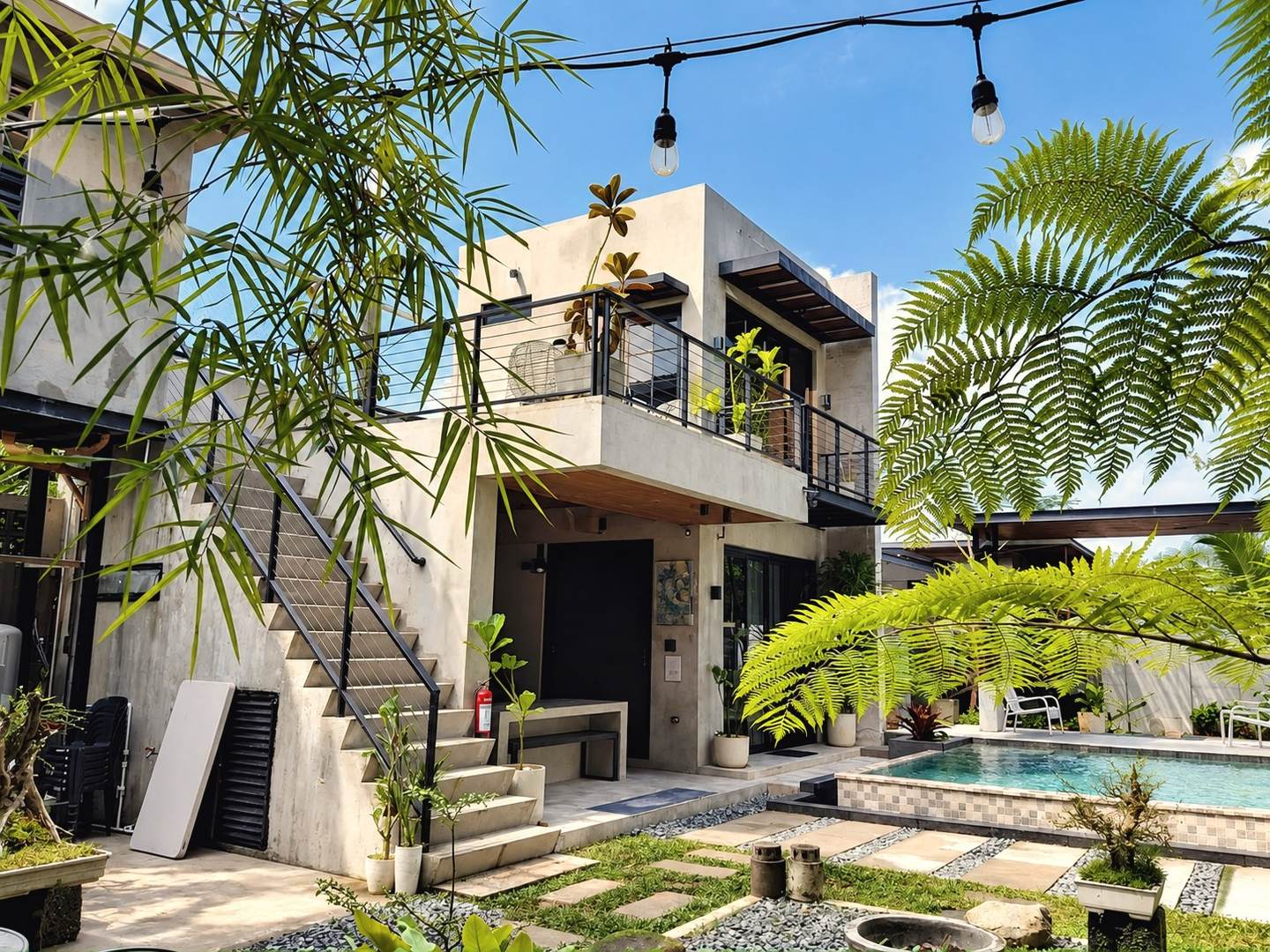 The villa, garden and pool