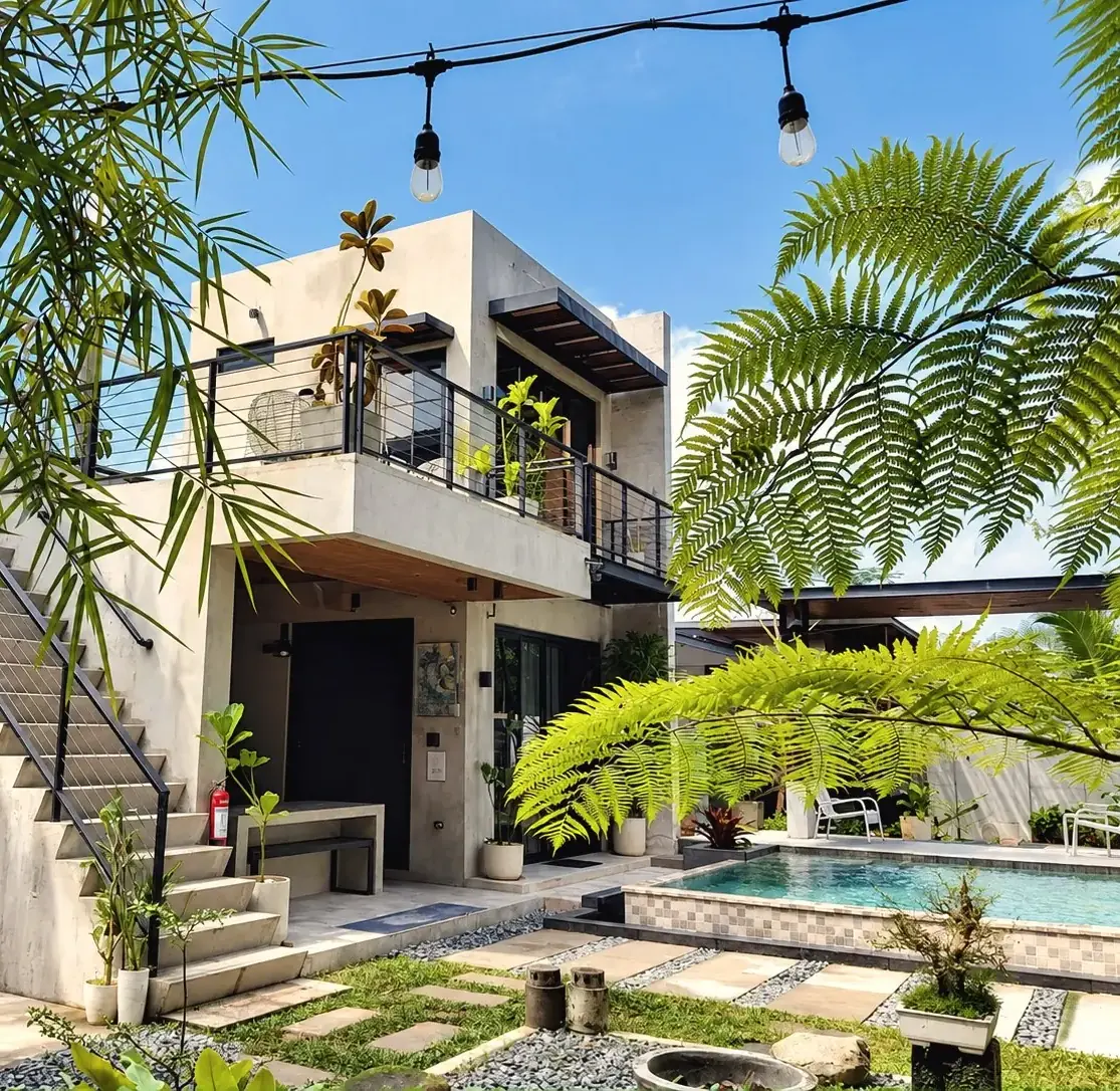 The villa, garden and pool