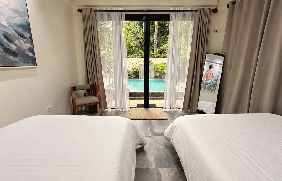 Bedroom 2 glass door facing the pool
